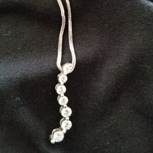 7stone curved diamond necklace